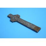 A Celtic bronze cross, decorated in low relief. 14.5cm length