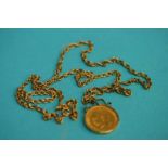 A half sovereign dated 1912 , in a 9ct gold mount and chain. Total weight 11.8grams