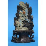 A late 19th Century soapstone mountain group. 25.5 cm high