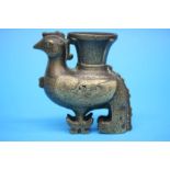 A small bronze zoomorphic model of an exotic bird. 13.5cm high