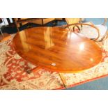 A reproduction Yew coffee table
