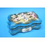 A large modern porcelain Sevres style trinket box and cover, decorated with putti