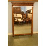 An oak framed mirror. 72cm x 110cm
