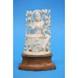 An Indian ivory figure of a deity, early 20th century. 20 cm high