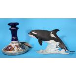 A Kaiser porcelain figure of a killer whale, limited edition 616/4000 and a Wade 'Pussers Rum'