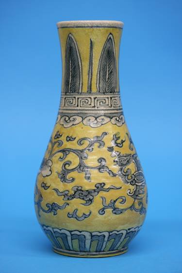 A Ming style yellow ground vase. 23cm high