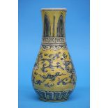 A Ming style yellow ground vase. 23cm high