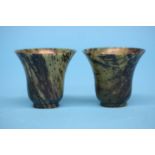 A pair of 19th Century spinach Jade flared beakers, seal marks to base. 5.5 cm high