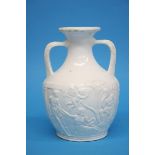 A 19th century porcelain Portland vase on a polished white ground, with classical relief figure of a