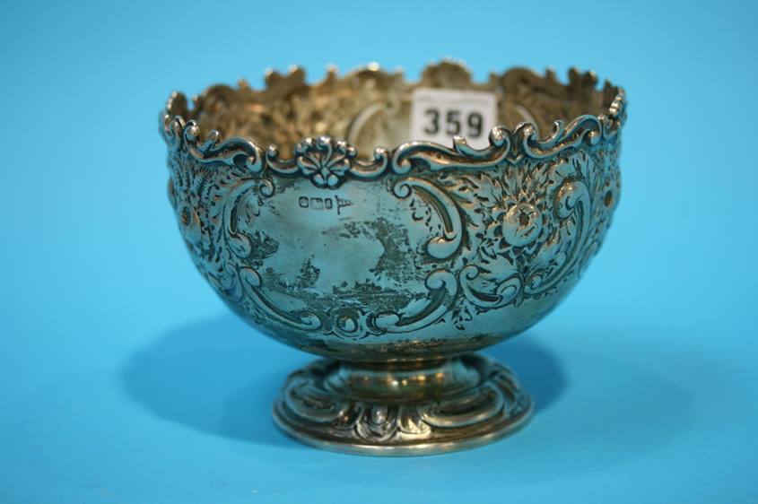 A Sheffield silver pedestal embossed bowl. 11oz / 343.9 grams