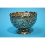 A Sheffield silver pedestal embossed bowl. 11oz / 343.9 grams