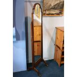 A walnut cheval mirror