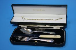 A boxed sterling silver Christening set and a 9ct gold bracelet. Weight 4.1grams