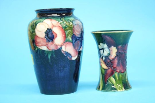 A Moorcroft vase on a blue ground, decorated with pansies and another on green ground decorated with - Image 3 of 8