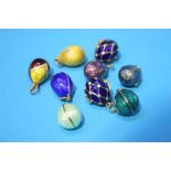 A collection of nine miniature Russian enamelled eggs, stamped 84