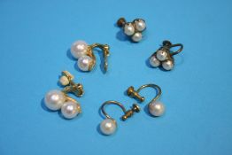 A pair of 18ct gold mounted pearl earrings and two other pairs