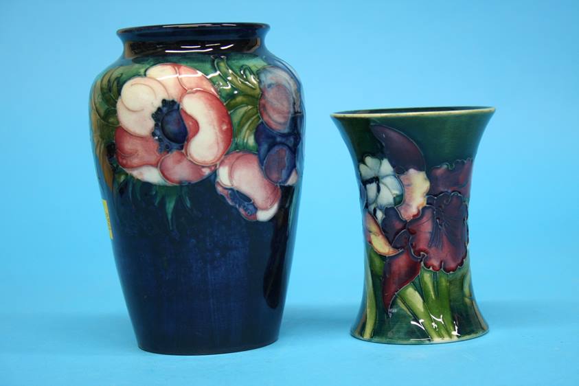 A Moorcroft vase on a blue ground, decorated with pansies and another on green ground decorated with - Image 2 of 8