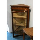 A Victorian walnut hanging corner cabinet