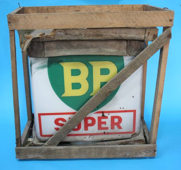 Three 'BP' glass petrol pump light shades, two 'BP Super' and one 'BP Regular', (one still in its