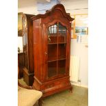 A reproduction walnut display cabinet. 91cm x 200cm