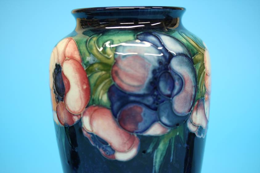 A Moorcroft vase on a blue ground, decorated with pansies and another on green ground decorated with - Image 7 of 8