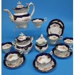 A Coalport tea service comprising teapot, sucrier, cream jug and seven cups and six saucers (15)
