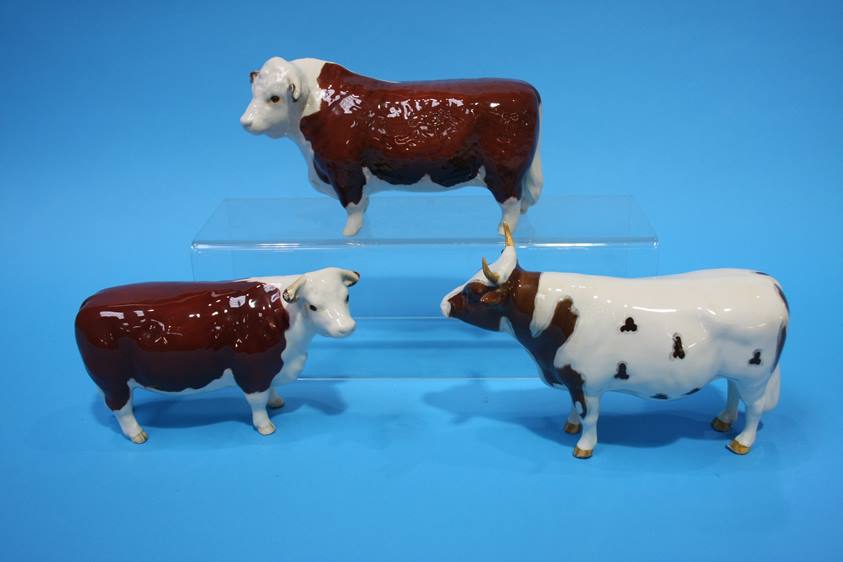 A Beswick 'CH Whitehall Mandate' bull and two 'CH of Champions' bulls (3)