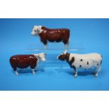 A Beswick 'CH Whitehall Mandate' bull and two 'CH of Champions' bulls (3)