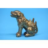 An early 17th/18th Century polished bronze figure of a lion. 6 cm high