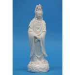 A late 19th/early 20th Century blanc de chine figure of Guanyin. 30 cm high