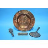 A copper dish and part Arts and Crafts pewter brush set