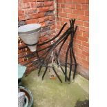 A wrought iron planter