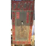 A large Oriental silkwork wall hanging depicting a lady and deer, set with mother of pearl