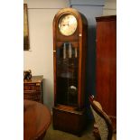 An early 20th century oak long case clock