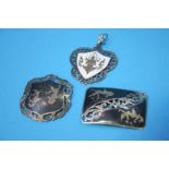 Three Siam sterling silver brooches and pendants