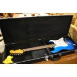 A Fender Stratocaster in travel case