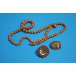 A Coral beaded necklace and two early 19th century memorium brooches set in coral