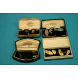 A pair of Eastern style cuff links, two pairs of Siam cuff links and a pair of cuff links made