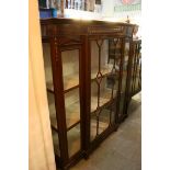 An Edwardian mahogany display cabinet. 127cm x 40cm x 139cm