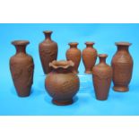 Seven various 20th Century Oriental terracotta vases