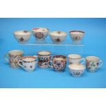 Six 18th century Chinese export porcelain tea cups and five tea bowls.