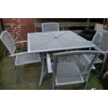 Garden table and four chairs, plant pot and chimney pot