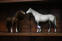 Two Beswick horses