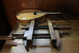 Two clamps and a mandolin