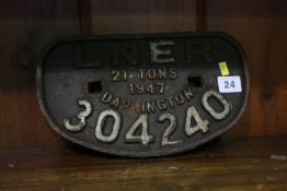A cast iron Wagon plate