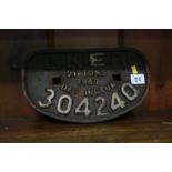 A cast iron Wagon plate