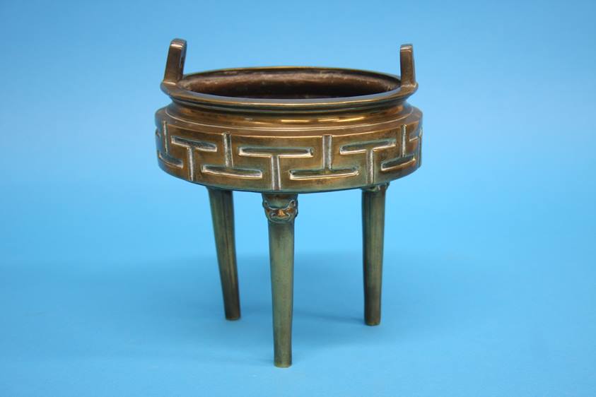 A bronze tripod censer with lion mask terminals and geometric design. 17 cm diameter by 20 cm high - Image 2 of 4