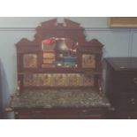 A marble topped mahogany washstand