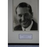 Clark Gable (1901 - 1960) signature, mounted and framed together with a photograph from the 1939