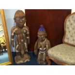 A pair of large carved African figures